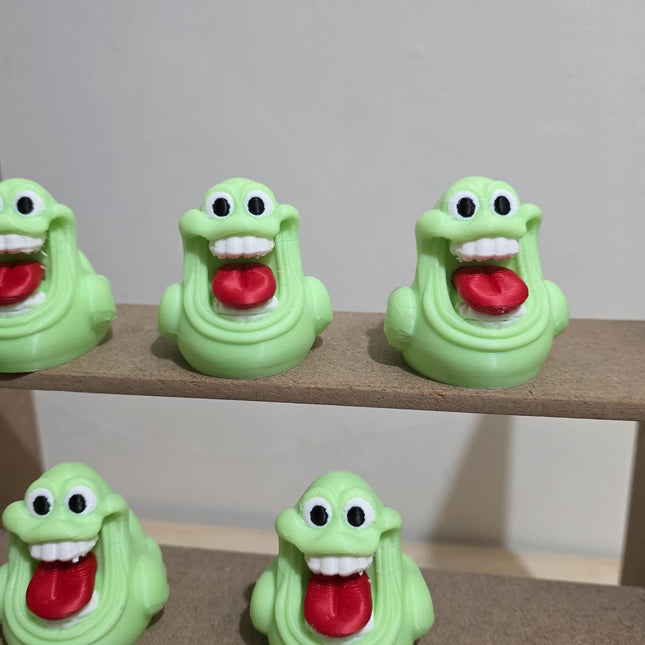 Figura coleccionable de pato fantasma que brilla en la oscuridad, inspirada en Slimer